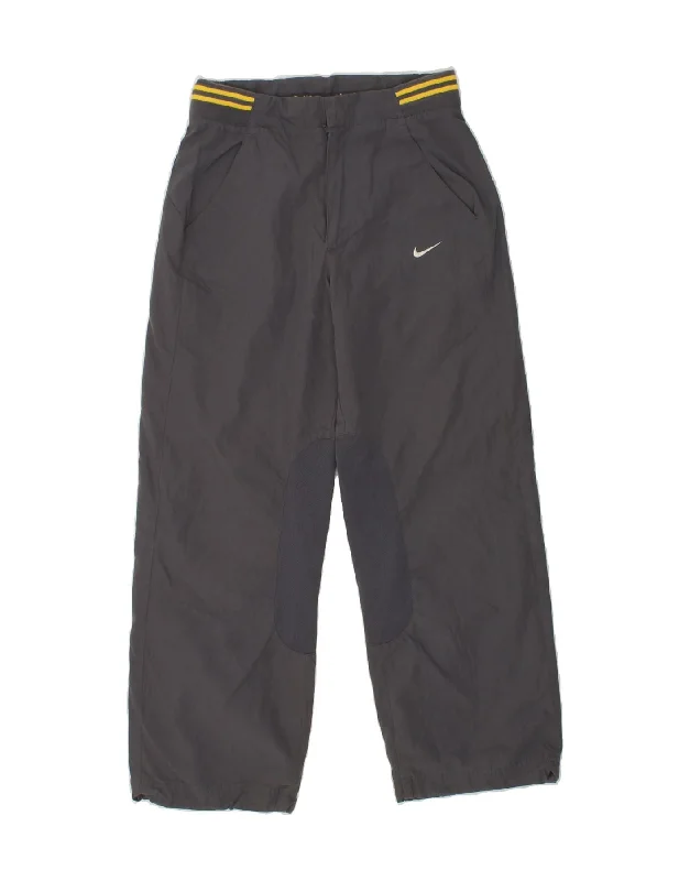 NIKE Boys Graphic Tracksuit Trousers 10-11 Years Medium Grey Polyester