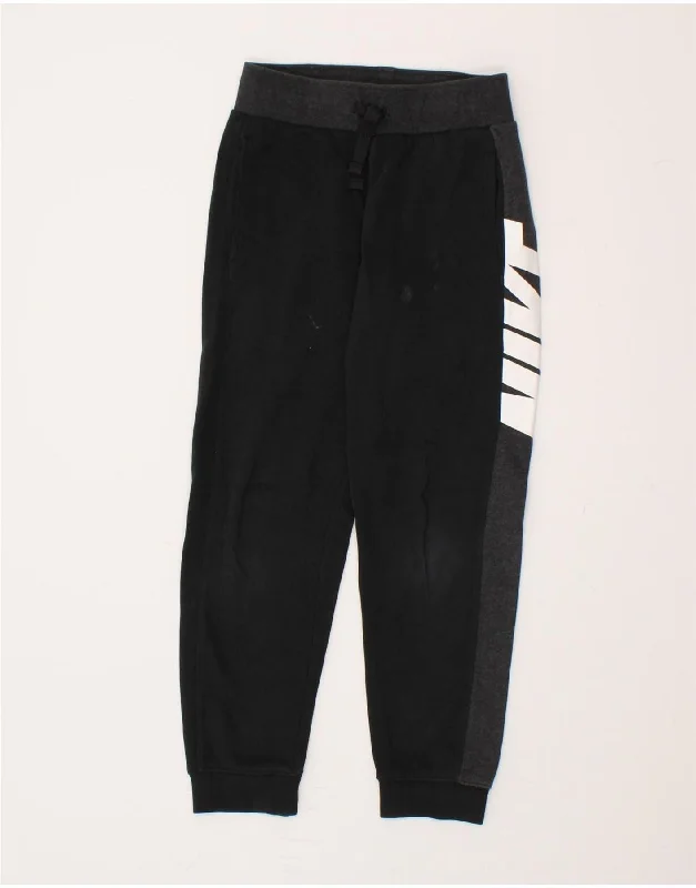 NIKE Boys Graphic Tracksuit Trousers Joggers 8-9 Years Small Black