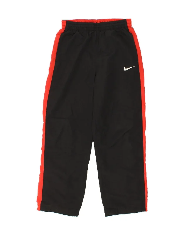 NIKE Boys Tracksuit Trousers 10-11 Years Medium Black Colourblock